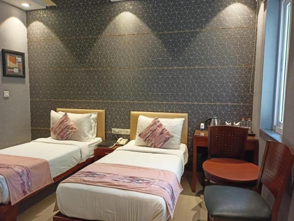 Cosy Grand, Near Chanakyapuri, Embassy Area : photo 7 de la chambre chambre deluxe double ou lits jumeaux