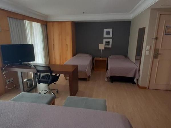 Mediterrâneo Flat - Apart-Hotel : photo 1 de la chambre chambre quadruple de luxe
