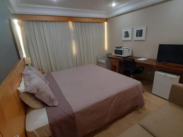 Mediterrâneo Flat - Apart-Hotel : photo 7 de la chambre chambre lit king-size deluxe
