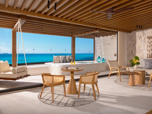 Impression Isla Mujeres by Secrets - Adults Only - All Inclusive : photo 2 de la chambre suite nuptiale - côté océan