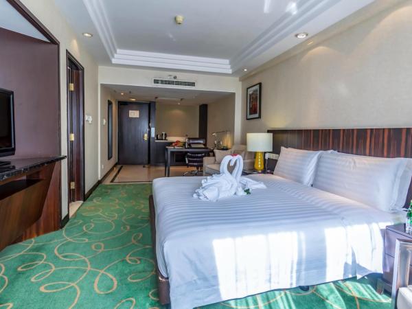 Guo Ji Yi Yuan Hotel : photo 1 de la chambre chambre double ou lits jumeaux exécutive