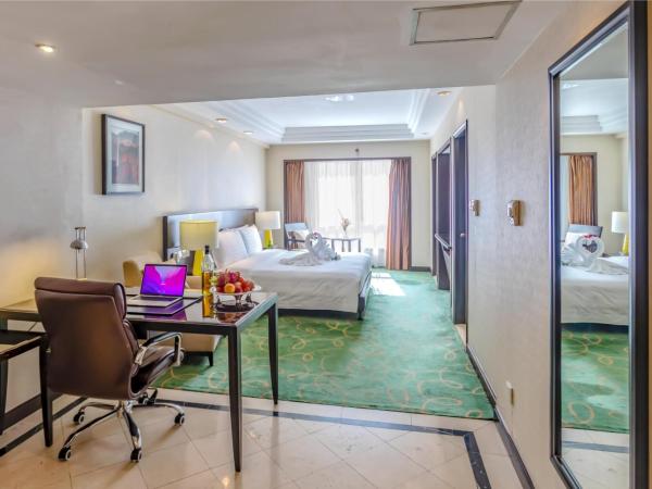 Guo Ji Yi Yuan Hotel : photo 3 de la chambre chambre double ou lits jumeaux exécutive