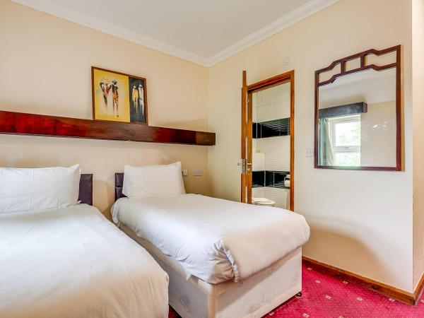 London Star Hotel : photo 1 de la chambre chambre lits jumeaux