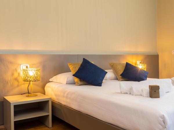 Martini Suite : photo 2 de la chambre chambre quadruple avec balcon 