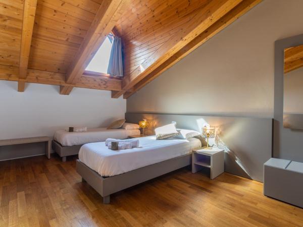 Martini Suite : photo 4 de la chambre premium triple room with single beds