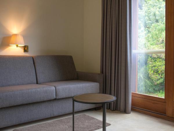 Hotel Santa Marta : photo 5 de la chambre chambre familiale - vue sur jardin