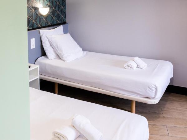 Hotel Luxia : photo 6 de la chambre chambre lits jumeaux