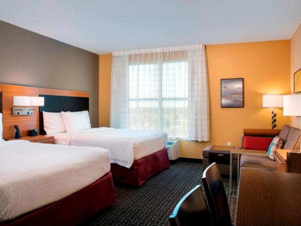 TownePlace Suites Orlando at FLAMINGO CROSSINGS® Town Center/Western Entrance : photo 5 de la chambre suite 2 lits queen-size avec canapé-lit