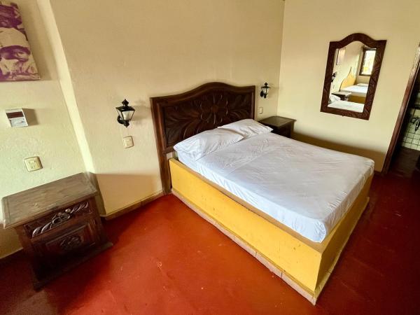 Hotel Rancho Escondito : photo 4 de la chambre chambre triple - vue sur jardin