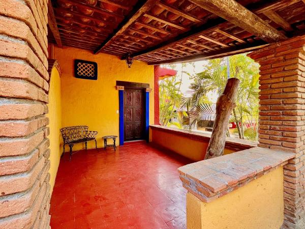 Hotel Rancho Escondito : photo 4 de la chambre chambre triple avec terrasse