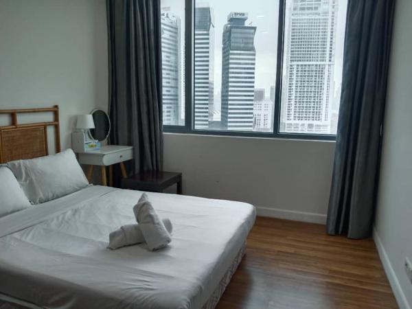 Mercu Summer Suites KLCC By Classy : photo 1 de la chambre chambre simple deluxe avec balcon