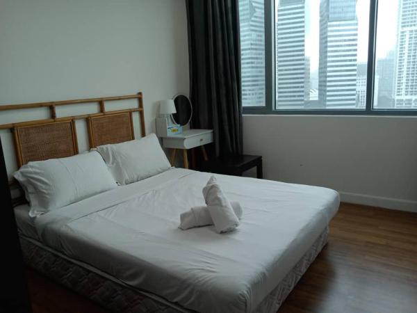 Mercu Summer Suites KLCC By Classy : photo 6 de la chambre chambre simple deluxe avec balcon