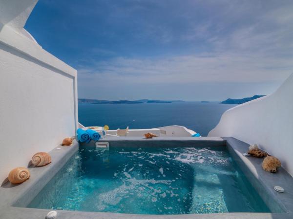 Kima Oia Suites : photo 1 de la chambre suite troglodyte supérieure avec jacuzzi