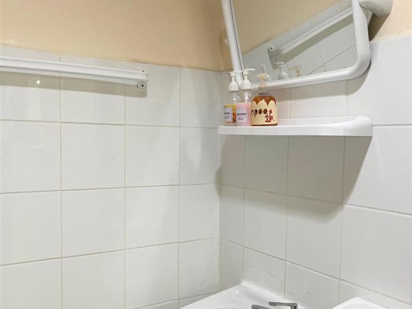 Golf-Sea-City Guest House : photo 9 de la chambre chambre lit queen-size avec balcon