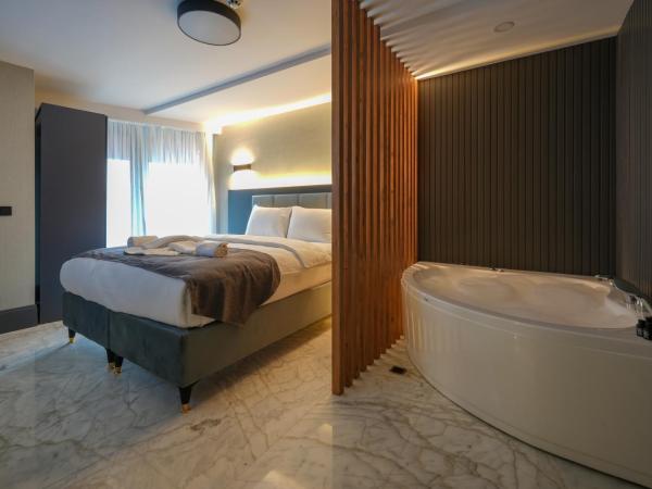Hotel Kurucesme Business : photo 1 de la chambre chambre double deluxe avec baignoire