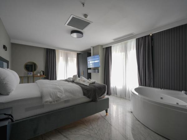 Hotel Kurucesme Business : photo 3 de la chambre chambre double deluxe avec baignoire