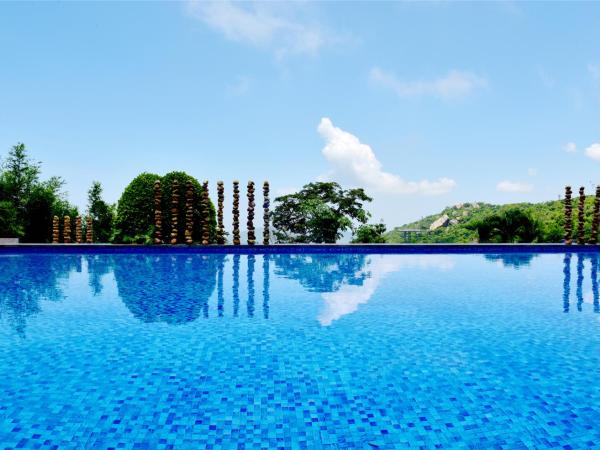 Yalong Bay Earthly Paradise Birds Nest Resort （Mountain Villas) : photo 5 de la chambre  cloud roc respect enjoy twin bed room (only accommodate citizens of mainland china with a valid people's republic of china id card upon check-in)