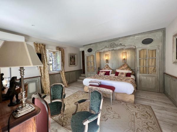 Villa Hautvallon : photo 1 de la chambre chambre lit king-size - vue sur jardin