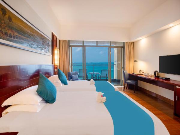 Shengyi Holiday Villa Hotel : photo 3 de la chambre limited offer - deluxe room with balcony and sea view (seafood barbecue buffet dinner for 2 persons)
