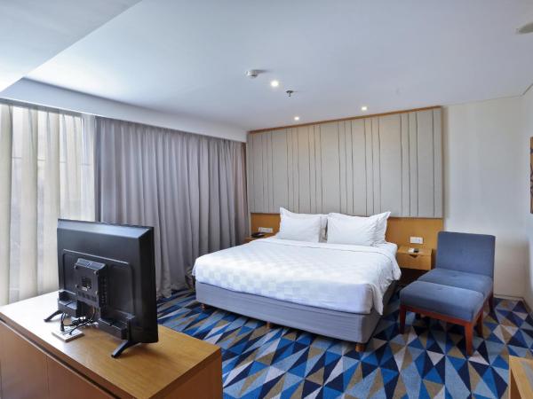 Swiss-Belhotel Pondok Indah : photo 1 de la chambre suite affaires