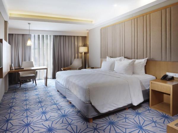 Swiss-Belhotel Pondok Indah : photo 1 de la chambre chambre double supérieure deluxe