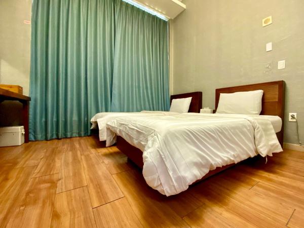 Myeongdong Merlin Hotel : photo 6 de la chambre chambre lits jumeaux deluxe