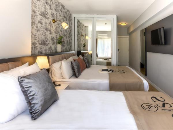 Niss Lara Hotel : photo 1 de la chambre chambre triple supérieure