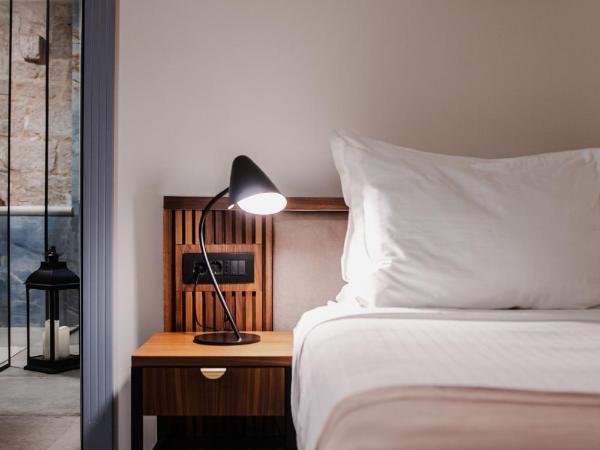 Armerun Heritage Hotel & Residences : photo 3 de la chambre chambre de luxe double ou lits jumeaux avec baignoire spa