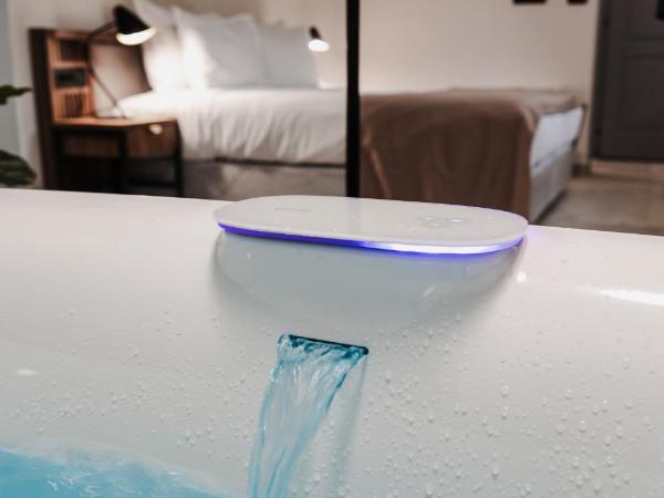 Armerun Heritage Hotel & Residences : photo 5 de la chambre chambre de luxe double ou lits jumeaux avec baignoire spa