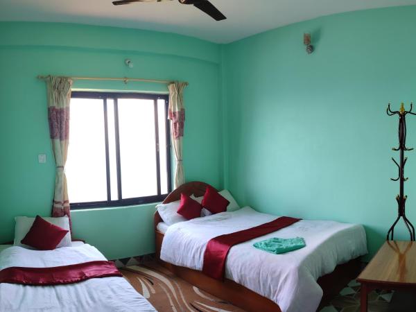 Sarangkot Hotel New Galaxy : photo 3 de la chambre chambre deluxe (2 adultes + 1 enfant)