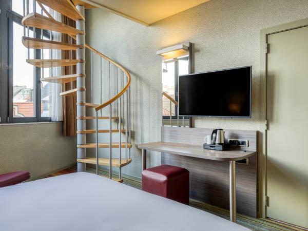 Alma Grand Place Hotel : photo 2 de la chambre chambre duplex famille & amis