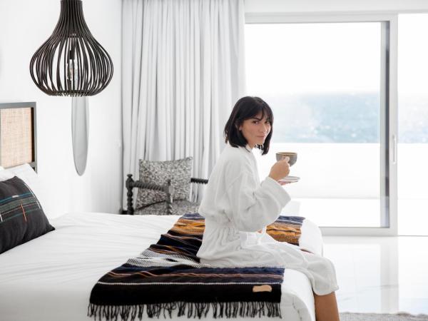 Kouros Hotel & Suites : photo 4 de la chambre suite sanctuaire avec piscine commune - vue sur mer