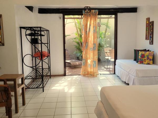 Pousada Casa do Catavento : photo 8 de la chambre chambre double supérieure avec balcon 