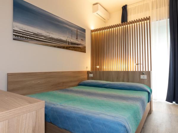 Hotel Wally : photo 1 de la chambre chambre double ou lits jumeaux Économique