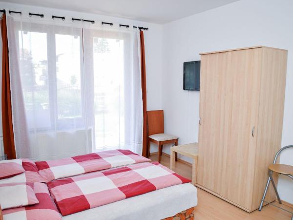 SovaApartman : photo 6 de la chambre chambre triple Économique