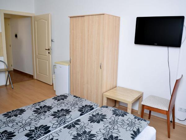 SovaApartman : photo 9 de la chambre chambre triple Économique