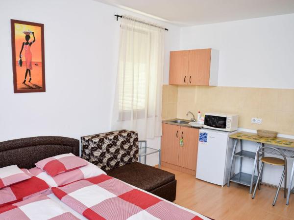 SovaApartman : photo 8 de la chambre chambre triple Économique