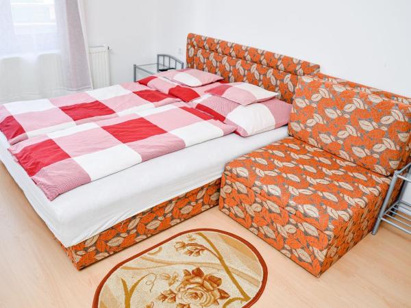 SovaApartman : photo 3 de la chambre chambre triple avec balcon