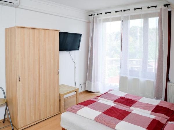SovaApartman : photo 6 de la chambre chambre triple avec balcon