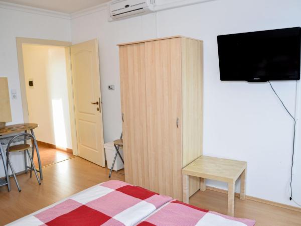 SovaApartman : photo 8 de la chambre chambre triple avec balcon