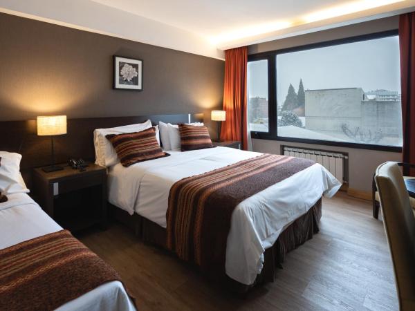 Hotel Crans Montana : photo 2 de la chambre chambre triple