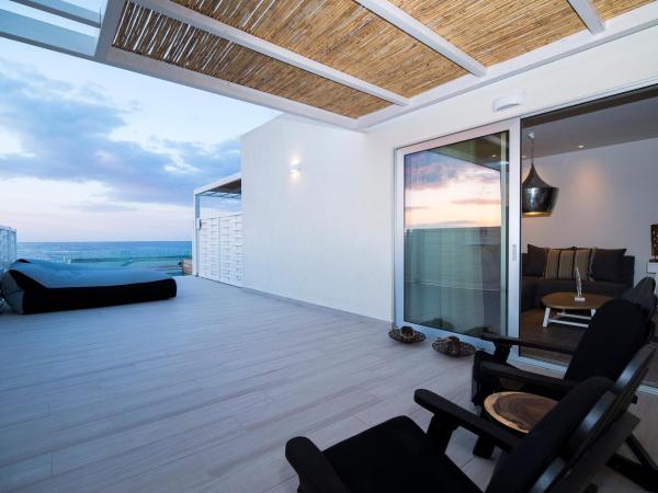 Insula Alba Resort & Spa (Adults Only) : photo 1 de la chambre suite avec piscine privée - vue sur mer