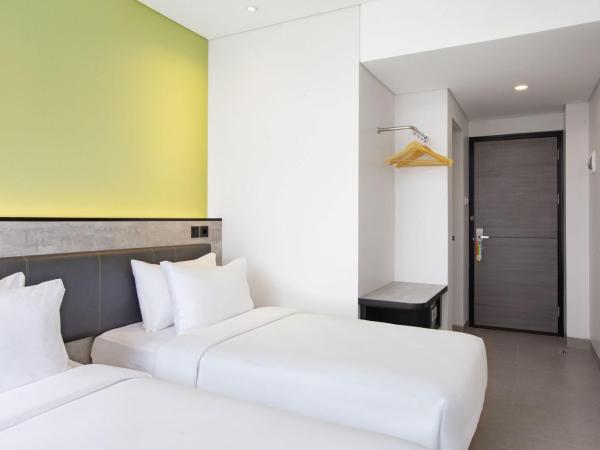 Amaris Hotel Kalimalang : photo 2 de la chambre chambre lits jumeaux smart