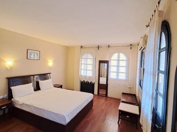Altinsaray Hotel : photo 2 de la chambre chambre avec vue sur la mer