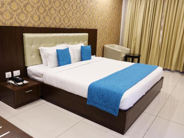 Blue Ocean Residency : photo 1 de la chambre chambre lit king-size