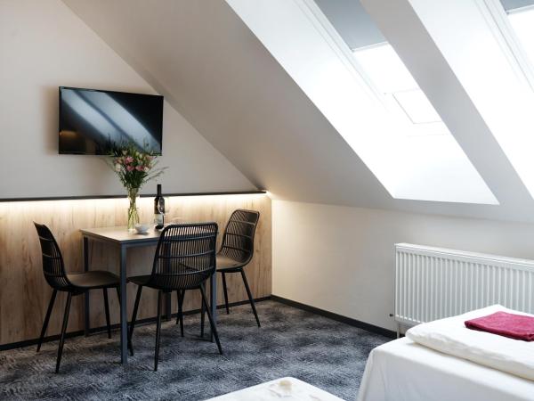 Penzion Smile : photo 4 de la chambre chambre triple avec salle de bains