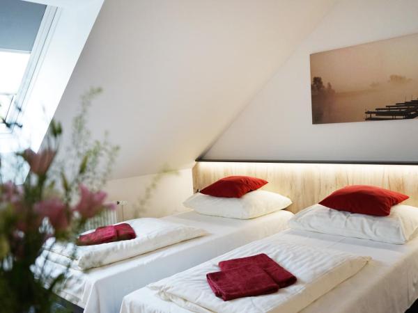 Penzion Smile : photo 2 de la chambre chambre triple avec salle de bains commune