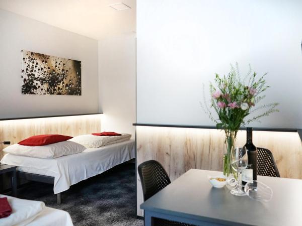 Penzion Smile : photo 1 de la chambre chambre triple avec salle de bains commune