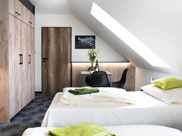 Penzion Smile : photo 1 de la chambre chambre triple avec salle de bains privative