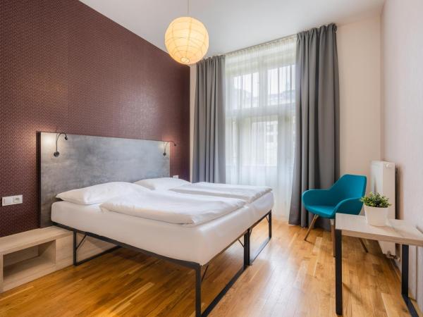 EA ApartHotel Melantrich : photo 4 de la chambre appartement supérieur avec balcon - 4 personnes